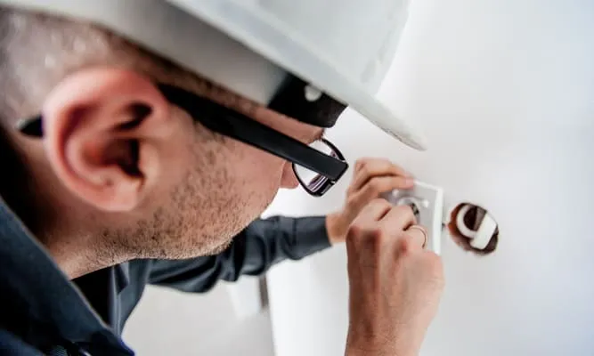 HVAC technician working on an install